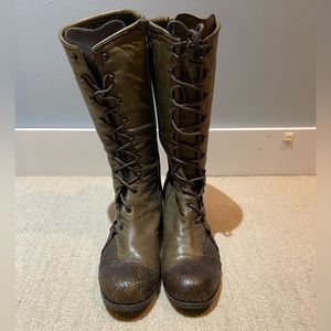 Genuine leather boots with snakeskin detail and wooden heals.